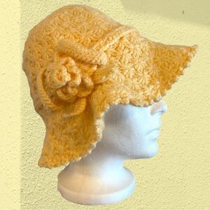 Vintage yellow crochet wool bucket hat with rosette